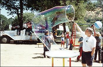 Picture of Ken making a very large bubble.