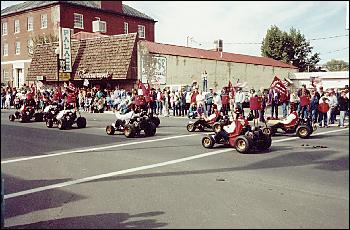 Picture of Shriners on go-carts.