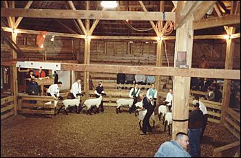 Picture of inside of round sale barn.
