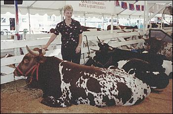 Picture of Lynn Pimentel with Longhorns.