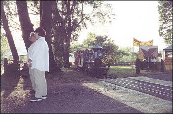 Picture of Joyce and Vicki talking while the little train goes by.