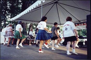 Picture of Country Cloggers on the stage.