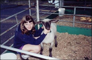 Picture of Nicole Loehr with her goat Gertrude.