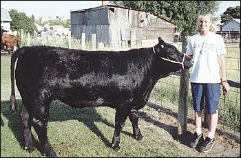 Picture of Lea Ganos with her steer.