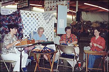 4 ladies doing Bobbin Lace stitchery